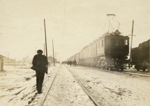 #10100 with Train #16 at Three Forks, Montana, January 21, 1916.